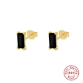 Macro shot of 925 sterling silver rectangular earrings with black gemstones and 925 hallmark - Gold - Black Zirconia