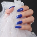 Glossy deep blue stiletto press-on nails with shiny UV finish shown on hands - Glossy Dark Blue (JJL-14)