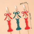 Christmas candle cake toppers with red and green bows and Merry Christmas text - Korean Christmas Style Candles 30pcs