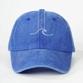 Navy blue washed denim baseball cap with white wave embroidery on front view - Sapphire Blue