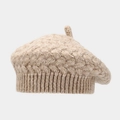 Detailed view of beige knit beret featuring thick wool texture and top loop detail - Khaki