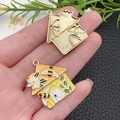 Front and back view of a bee hive enamel charm for DIY jewelry making and pendants - Beehive House