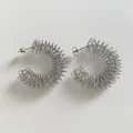Silver spring spiral hoop earrings in stainless steel with elegant C-shaped design - Silver (D1804)