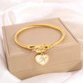 Golden titanium steel heart charm bracelet with engraved letter N on twisted band - Letter N