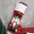 Rode kerstsok met notenkraker soldaat en witte imitatiebont rand decoratie - Rode Kerstsok