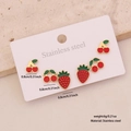 Set of 3 pairs of stainless steel cherry and strawberry stud earrings on display - Style 1 (3 Pairs Studs)