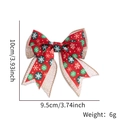 Detail view of double-layer faux linen Christmas bow with snowflake print and dimensions - Red Fabric Snowflake Print Style