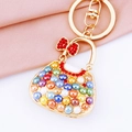 Golden handbag keychain with colorful pearls and red rhinestone bow pendant charm - Colorful Bow Handbag Keychain