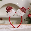 Christmas headband featuring Santa Claus faces and red plaid mini hats on festive snow - Christmas Headband (Double Santa)