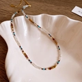 Collana di perline stile boho con dettagli turchesi e rossi in conchiglia - Collana No. 52 (Acciaio al Titanio Colorato)