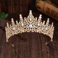 Detail of a luxury gold bridal crown with shimmering crystals and iridescent gems - Gold with AB Rhinestone