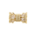 Close-up of gold-plated bow charm with pavé cubic zirconia for DIY jewelry making - VZ409 Gold White Zircon