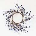 Detailed close-up of handmade blue berry wreath with dark brown realistic rustic branches - Blue