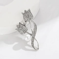 Elegant silver tulip brooch with white rhinestones and a large pearl on a white base - Tulip Silver Pearl