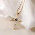 18K gold plated cross pendant necklace with clear zircon and blue gemstone on white silk - Blue and Clear Zirconia Style