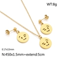 Conjunto de joyas de carita sonriente dorada con collar de emoji y pendientes - Dorado