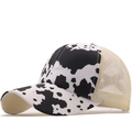 Crisscross ponytail baseball cap with cow print pattern and breathable mesh back - Adjustable / Black and White Cow Print Style (03)