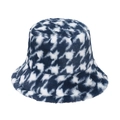 Detail shot of the thick blue and white houndstooth plush fabric on a warm bucket hat - Navy Blue