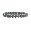 Macro detail of natural light green imperial jasper beads with smooth stone texture - Agate