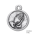Macro detail of antique silver praying hands medal charm with 15x19mm dimensions - Praying Hands