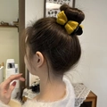 Winter yellow plush knitted bow hair claw clip for elegant bun styling hairstyle - Turmeric