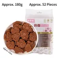 Christmas carousel cake box variant with black cocoa biscuits in festive relief shapes - Cocoa Flavor Biscuits 180g