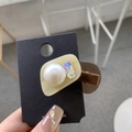 Detail shot of acetate duckbill hair clip with large faux pearl and iridescent rhinestone - Large Pearl Square Rhinestone Irregular Alligator Clip / Transparent Brown