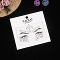 Macro shot of iridescent face jewels and crystal rhinestone stickers for music festivals - AB White