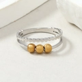 Detail of silver double-layer steel ring featuring three movable frosted gold beads - Double Layer Gold Color Frosted Beads