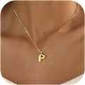 Polished golden letter P pendant necklace with fine box chain worn by a female model - Gold P