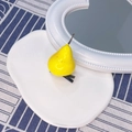 Detail of creative yellow pear hair clip on ceramic tray with glossy resin finish - Yellow Pear