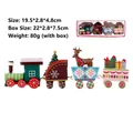 Red and green wooden Christmas train set with Santa, reindeer, and tree ornaments - Colorful