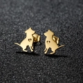 Minimalist gold dog-shaped stud earrings with heart cutout on dark textured surface - 282 Gold (Sitting Dog)