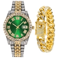 Macro view of gold-tone iced-out watch with green sunray dial and Cuban link bracelet - Green Watch + Gold Bracelet