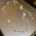 Baroque irregular pearl necklace with gold chain detail on a metallic tray - 64# Gold Irregular Pearl Splicing Necklace