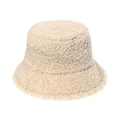 Close-up of fluffy cream lamb wool fisherman hat showing thick texture and soft fleece - Beige