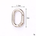 Close-up of 1.3cm x 2cm silver zinc alloy spring ring hook with size and weight labels - 20mm Round Spring Ring / Silver