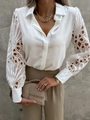 Detailed close-up of white women's shirt with intricate floral lace eyelet sleeves - 3XL / Tops / White