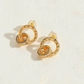 Detailed close-up of gold ear studs with Roman numerals and micro-pave white zircons - Roman Numeral Double Hoop Pendant / Gold