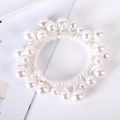 Detail of white pearl hair tie with assorted imitation pearls on white elastic cord - 6# White Elastic Faux Pearl Hair Tie