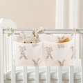 Detail of cotton baby crib organizer with two pockets and watercolor rabbit print - Rabbit