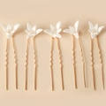 Detail of 5-piece bridal U-shaped hair pins with white ceramic flowers and gold crystals - SHSS5385-5Pcs Set/Gold/Classic Style