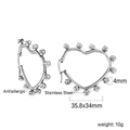 Detail of silver heart-shaped stainless steel hoop earrings with bead trim and size info - Heart Beaded Style (EA313301S)