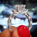 Sparkling silver ring with emerald cut center stone and micro-pave hollow band detail - US 7 / White Gold