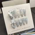Smoky blue press-on nails with 3D angel relief, pearls, and butterfly bow accents - Extra Small (XS) / Mist Blue Long Trapezoid
