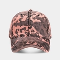 Detailed macro view of pink and black leopard print on washed denim baseball cap texture - Adjustable / Pink