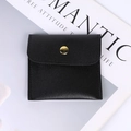 Black leather jewelry pouch with gold snap button on a stylish lifestyle background - Leather Style (Black) / 8x8cm