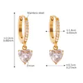 Detail view of heart-shaped zircon earrings in gold-plated stainless steel with size specs - Huggie Heart Earrings (Q167)