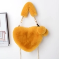 Cute heart-shaped faux fur crossbody bag in bright yellow with gold chain strap - Ginger Yellow