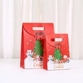 Detail of red Christmas paper gift bags in large and small sizes with festive illustrations - 20x14x7cm / Bright Red (Santa/Elk)